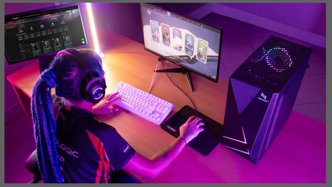 menina sentada em um setup gamer com pc rainbow